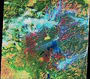 Image by a thematic mapper taken on September 8, 1988, while huge fires still rage.  This image links to a more detailed image.