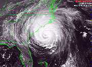 Image of a hurricane hitting the U.S. east coast.  This image links to a more detailed image.
