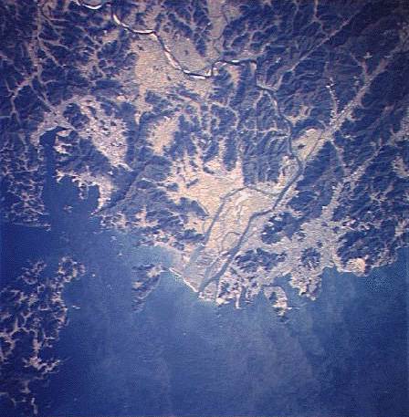 Image showing the port city of Pusan, the delta of the Naktong River, and the town of Masan.  Please have someone assist you with this.