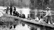 Image of some native people in a boat.