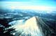 Image of Mount St. Helens showing an  ash-darkened east slope on March 30, 1980.  This image links to a more detailed image.