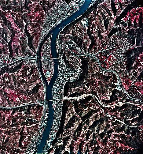 Image showing an infrared aerial photo of downtown Wheeling, the Ohio River, and lower Wheeling Creek as they appeared in 1991.