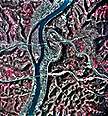 Image showing an infrared aerial photo of downtown Wheeling, the Ohio River, and lower Wheeling Creek as they appeared in 1991.  This image links to a more detailed image.