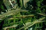 Image showing an aerial view of a third-order stream entering a fourth-order stream. This image links to a more detailed image.