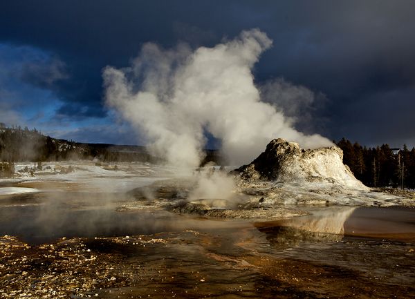 Steam rises from Castle Geyser in Yellowstone National Park (file photo). Photograph by Mark Thiessen, National Geographic
