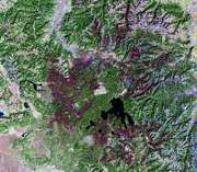 Image of a landsat image taken in September 1988 showing burned areas in the Yellowstone National forest.  This image links to a more detailed image.