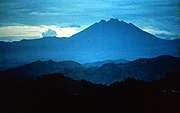 Image looking along the Virunga mountain chain toward Mount Muhavura.