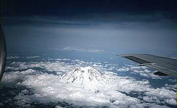 Image showing an aerial photograph of Mount Rainier from the southwest. This image links to an enlargement of Mount Rainier seen in aerial photograph.