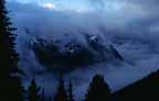 Image of some clouds and sea mist around the Olympic Mountains, WA.  This image links to a more detailed image.