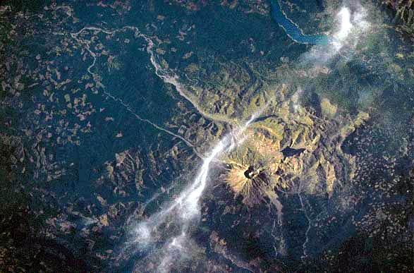 Image taken from a shuttle of Mount St. Helens showing destroyed area of the shattered cone of the mountain.