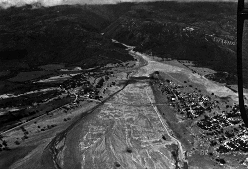 Image of an upstream view of the village of Armero, Columbia, about 50 km downstream of Nevado del Ruiz.